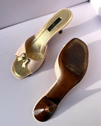 Mules Louis Vuitton Monogram rosa in denim con fiocco